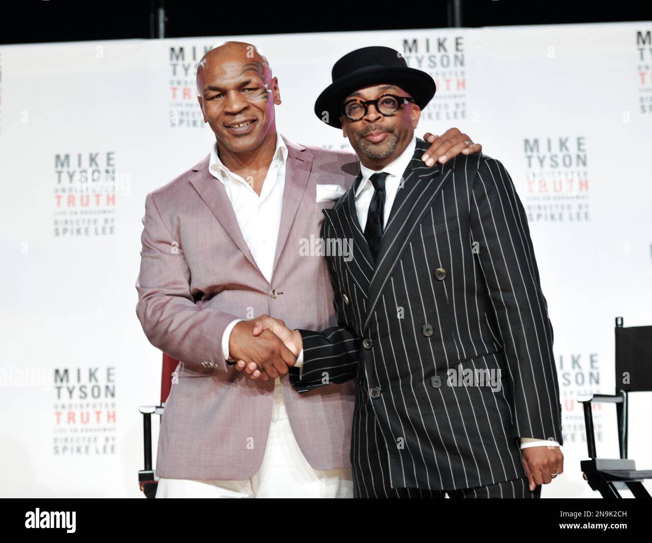 Former heavyweight boxer Mike Tyson, left, and director Spiken Lee ...