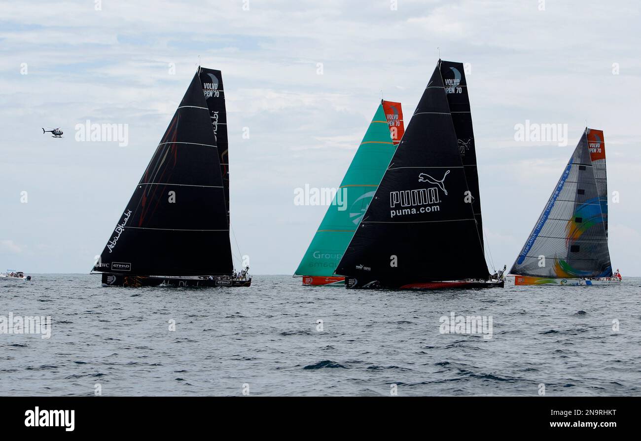 Abu Dhabi Ocean Racing, left, Groupama Sailing Team, PUMA Ocean Racing, and Team Sanya, right, sail a course at the start of Leg 7 of the Volvo Ocean Race sailing to Lisbon, Portugal, in Miami, Sunday, May 20, 2012.(AP Photo/Lynne Sladky) Stockfoto