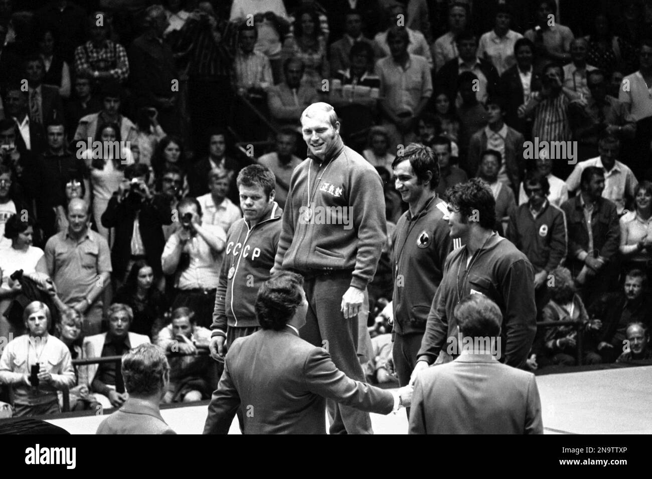 Winners of the judo Summer Olympic Games open category event stand on