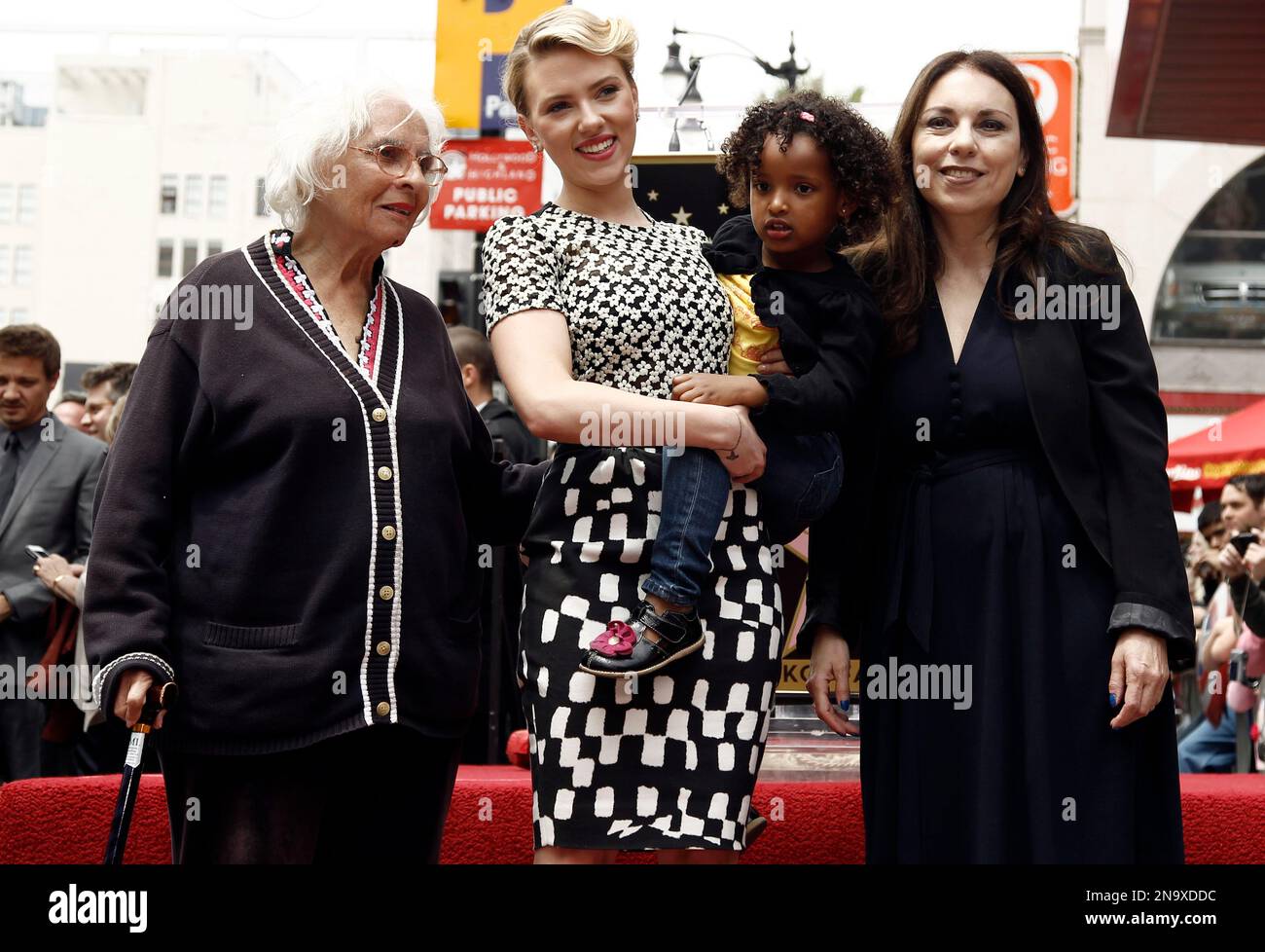 Actress Scarlett Johansson poses with family members from left
