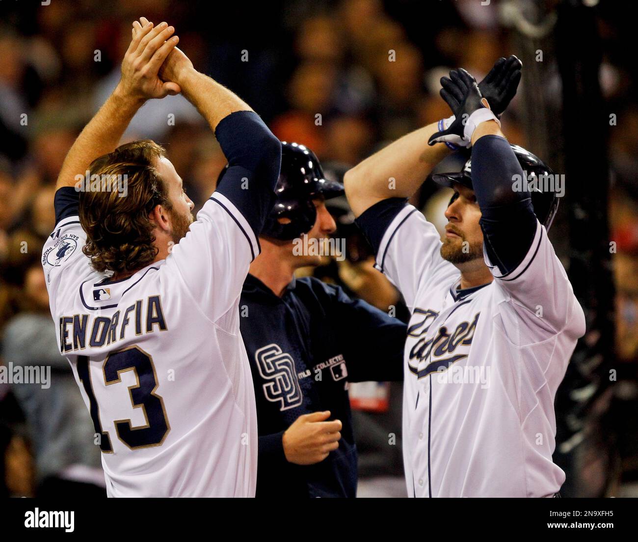 San Diego Padres' Mark Kotsay, right, is congratulated by teammate
