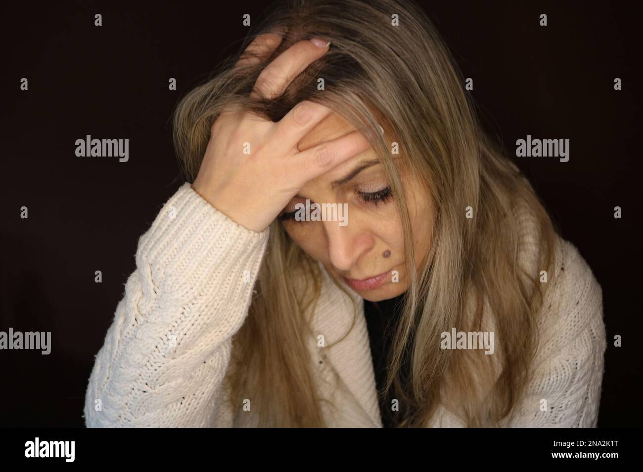 Traurige Frau Stockfoto