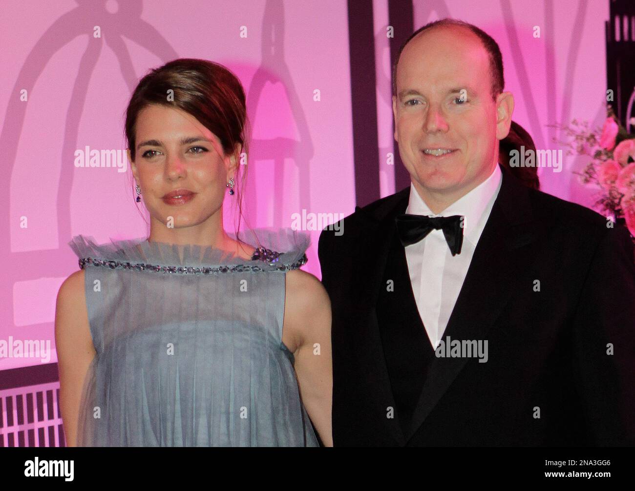 Prince Albert II of Monaco and his niece Charlotte Casiraghi arrive at the "Rose Ball", Saturday, March 24, 2012, in Monaco. (AP Photo/Lionel Cironneau) Stockfoto