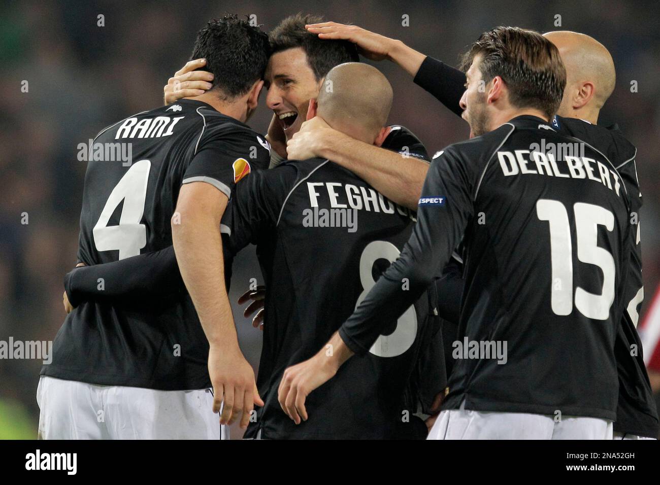 Valencia players celebrate scoring 1-0 against PSV during the second leg round of 16 Europa League soccer match at Philips stadium, south-central Netherlands, Thursday March 15, 2012. (AP Photo/Peter Dejong) Stockfoto