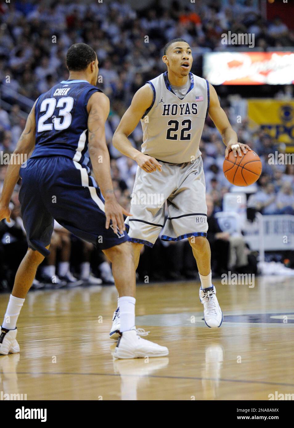 Georgetown forward Otto Porter (22) dribbles against Villanova guard Dominic Cheek (23) during the second half of an NCAA college basketball game, Saturday, Feb. 25, 2012, in Washington. Georgetown won 67-46. (AP Photo/Nick Wass) Stockfoto