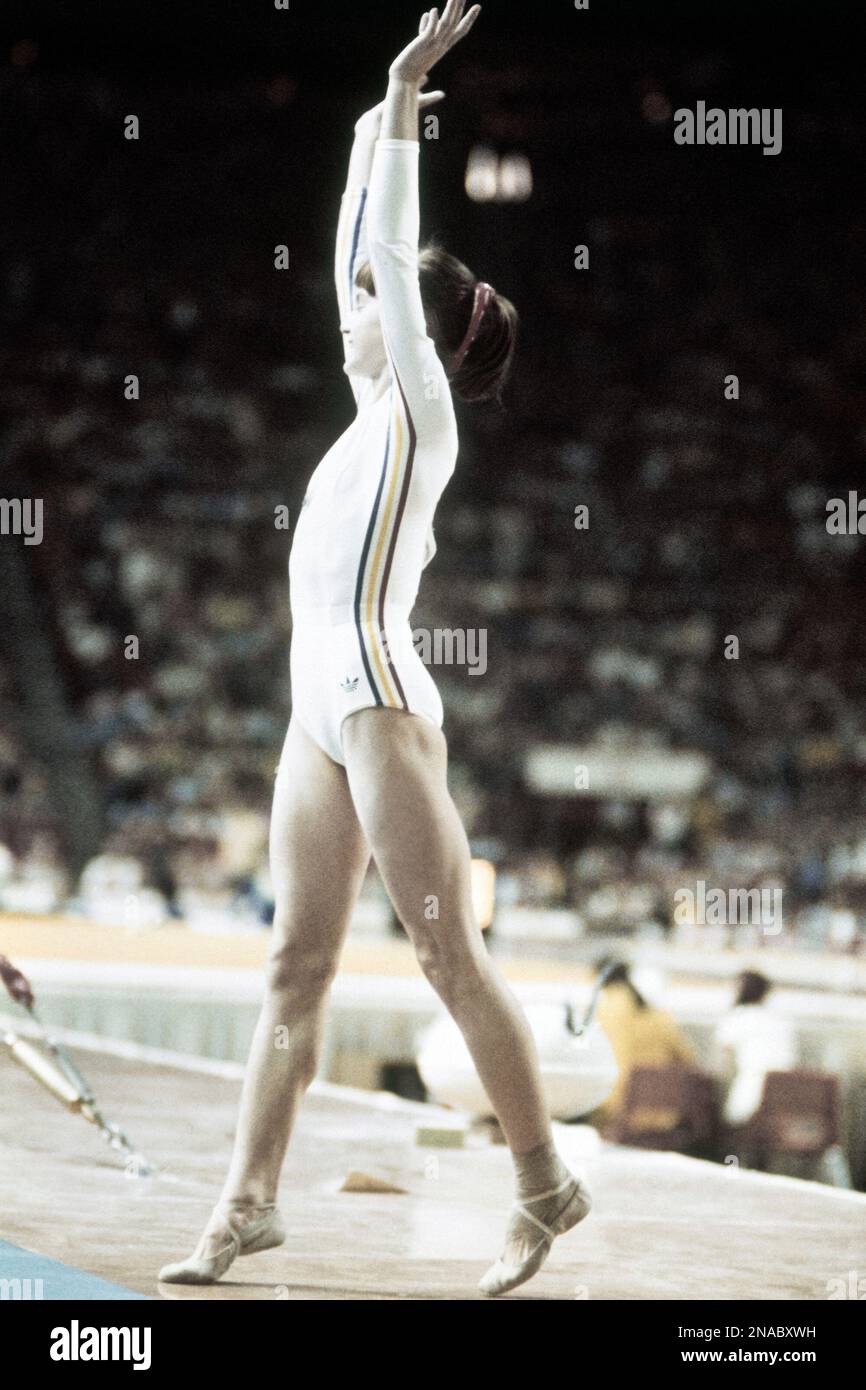 Romanian gymnast Nadia Comaneci in action at the Summer Olympic Games