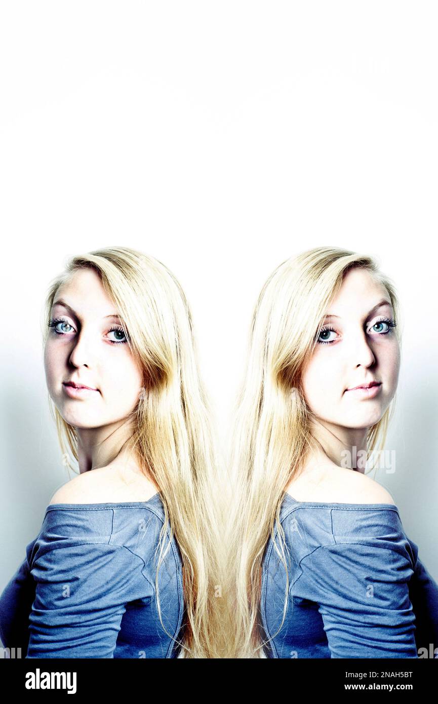 Porträt von zwillingblonden Mädchen mit langen Haaren Stockfoto