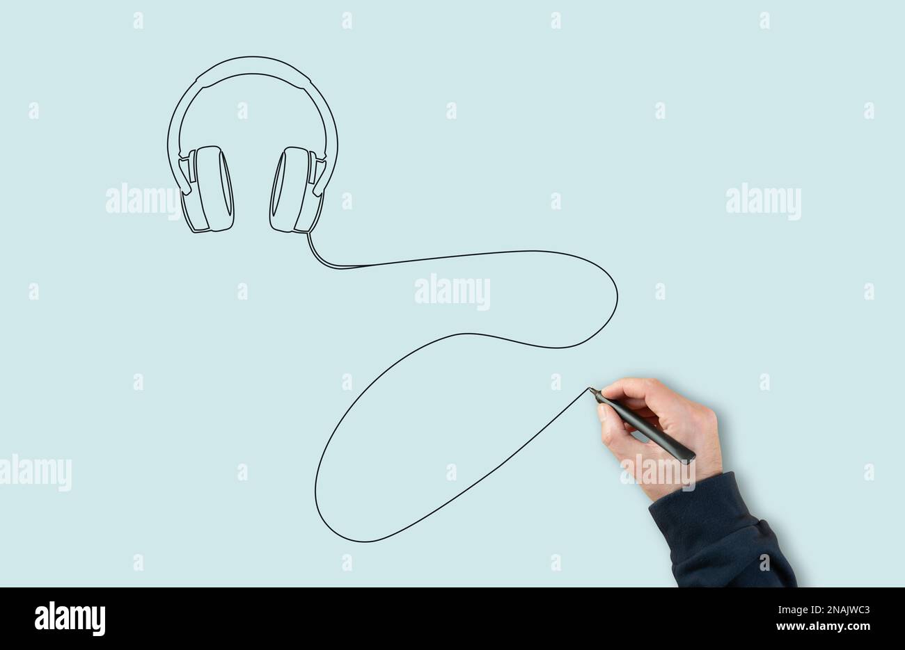 Mann mit schwarzen Marker, um Kopfhörer mit einem einzigen zu zeichnen Linie oder Einzelhub Stockfoto