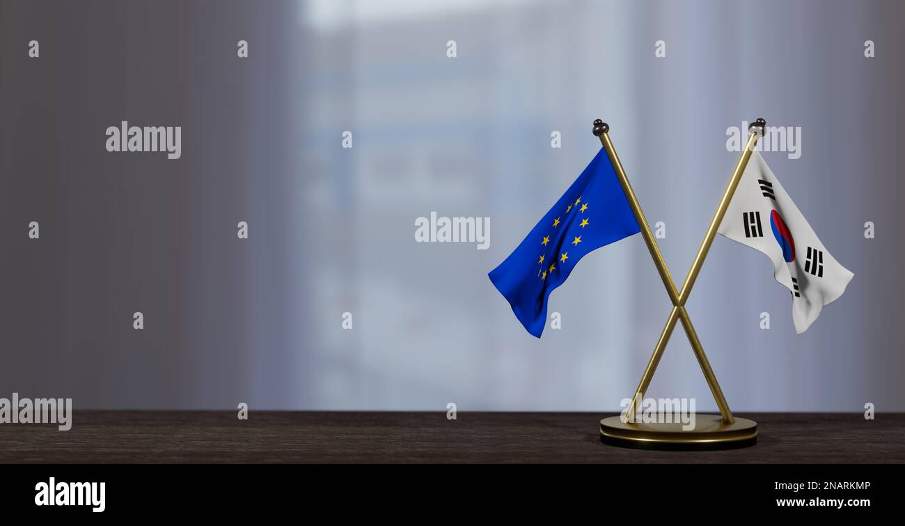 Südkoreanische und europäische Flaggen liegen auf dem Tisch. Verhandlungen zwischen Südkorea und der EU. Auf wenig unscharfem Hintergrund. 3D Arbeit und 3D Bild Stockfoto