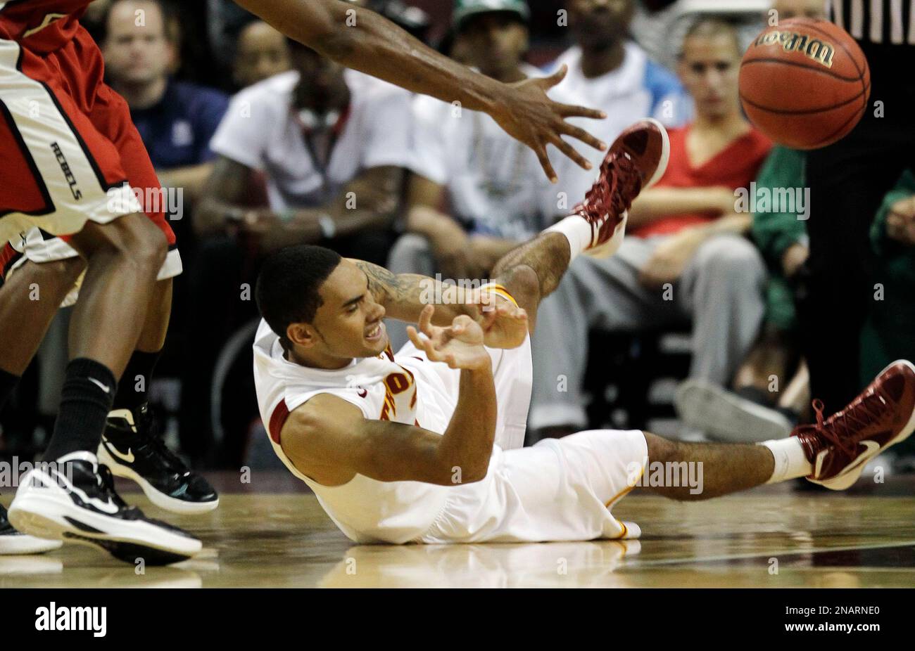 USC's Greg Allen is stripped of the ball by UNLV in the second half of an NCAA college basketball game, Friday, Nov. 25, 2011, in Las Vegas. UNLV 66-55. (AP Photo/Julie Jacobson) Stockfoto