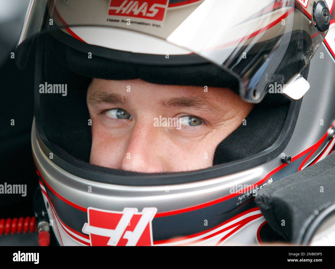 Driver Ryan Newman looks out from his car during practice for Sunday's NASCAR Sylvania 300 auto race at New Hampshire Motor Speedway, Friday, Sept. 23, 2011, in Loudon, N.H. (AP Photo/Mary Schwalm) Stockfoto
