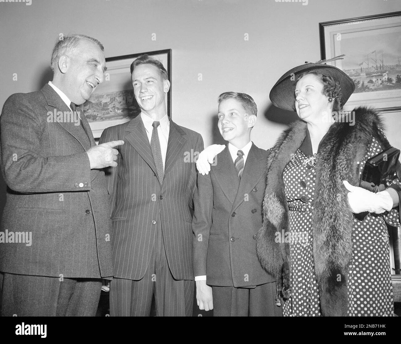 Judge Fred M. Vinson, left, new economic stabilization director, jokes