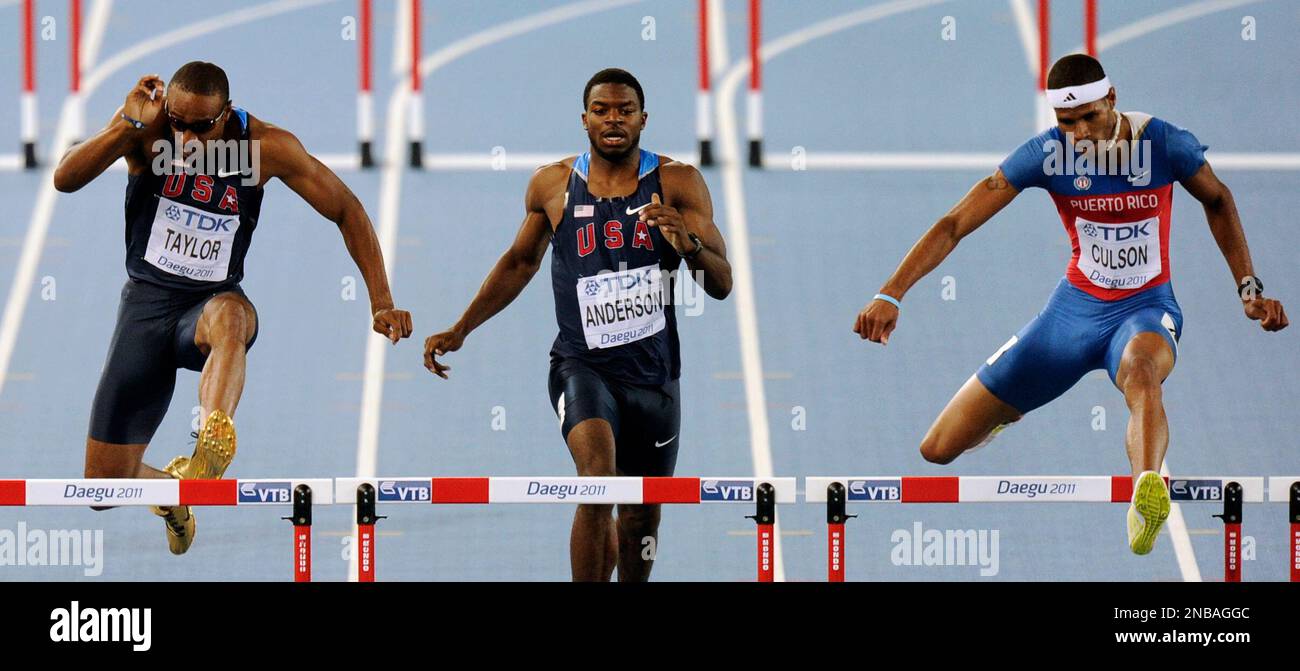 USA's Angelo Taylor, left, USA's Jeshua Anderson, center, and Puerto Rico's Javier Culson compete in a Men's 400m Hurdles semifinal at the World Athletics Championships in Daegu, South Korea, Tuesday, Aug. 30, 2011. (AP Photo/Martin Meissner) Stockfoto