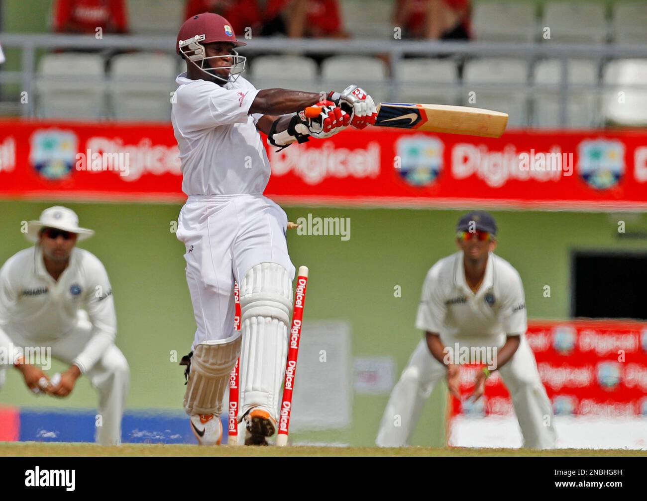 West Indies' Fidel Edwards is bowled by India's Ishant Sharma, not shown, on the second day of the third cricket Test match in Roseau, Dominica, Thursday, July 7, 2011. (AP Photo/Lynne Sladky) Stockfoto