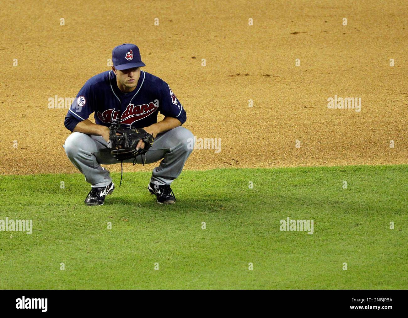 Cleveland Indians' Lonnie Chisehnhall watches a pitcher change against the Arizona Diamondbacks during the eighth inning of an interleague baseball game Monday, June 27, 2011 in Phoenix. (AP Photo/Matt York) Stockfoto