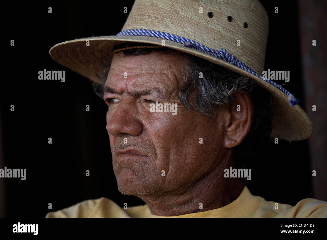 In this April 4, 2011 photo, Hector Gonzalez Rios watches from his home