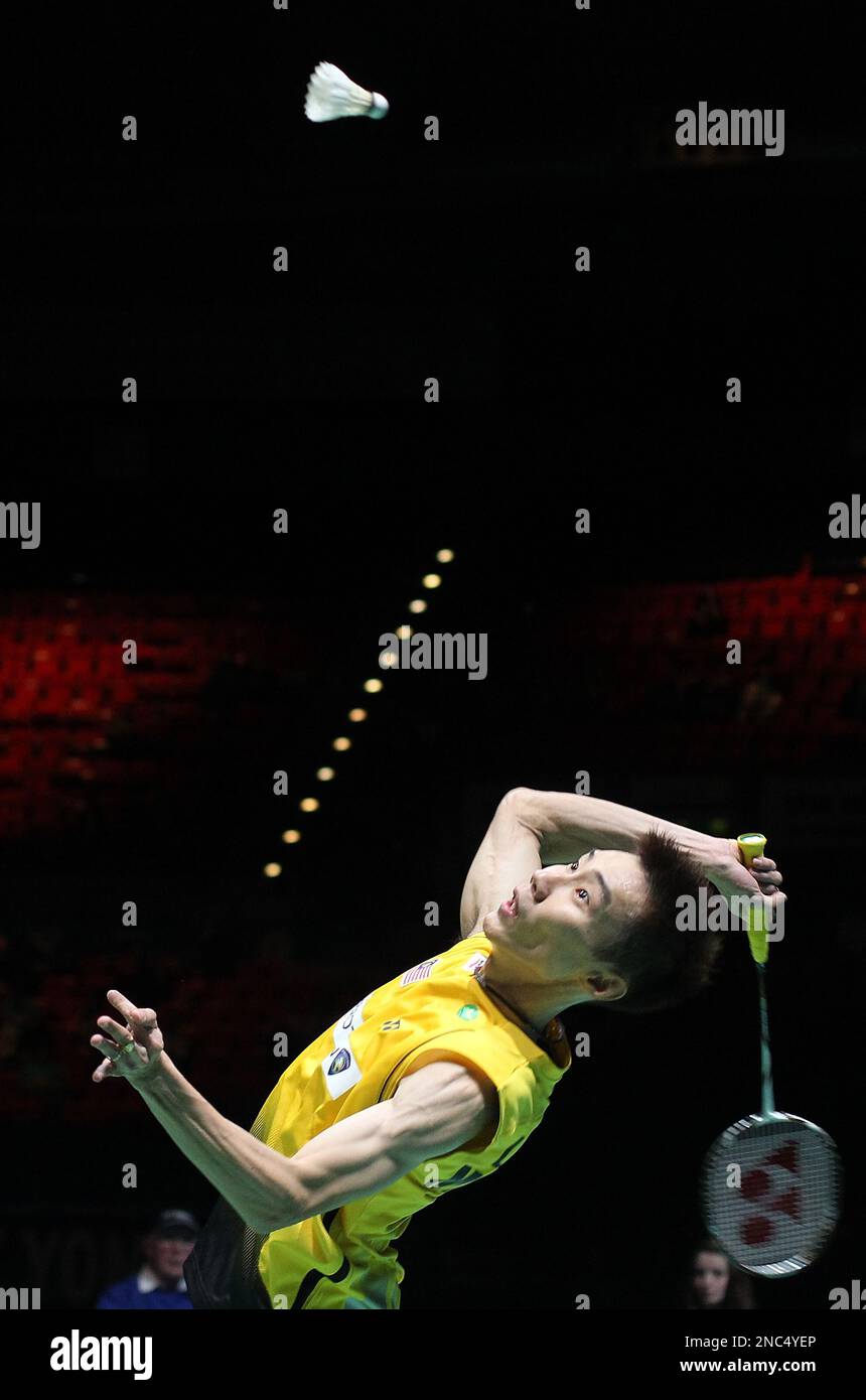 Malaysia's Lee Chong Wei hits a shot during his men's singles on All England Badminton final match against China's Lin Dan at in the National Indoor Arena, Birmingham, England, Sunday, March 13, 2011. (AP Photo/Simon Dawson) Stockfoto