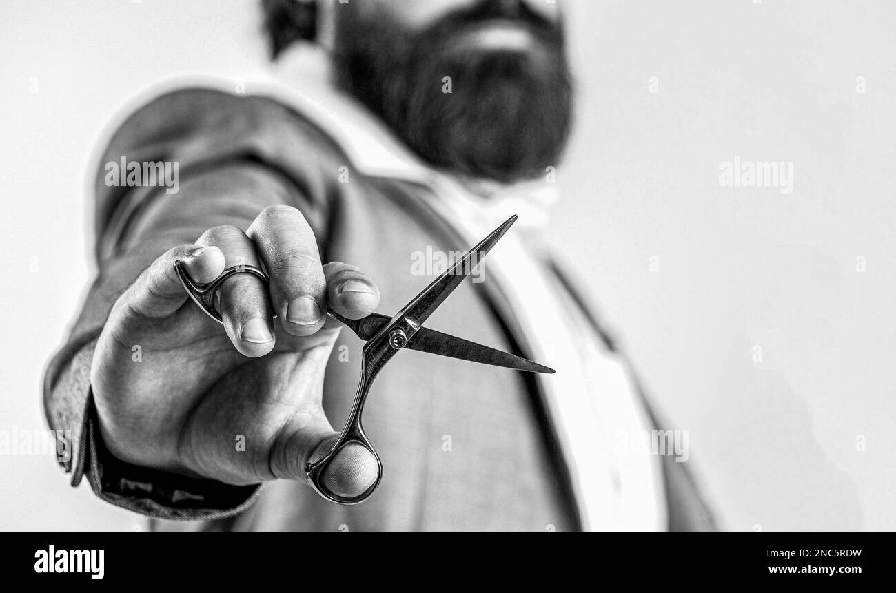 Ein klassischer Friseursalon. Vintage-Friseur, rasieren. Ein bärtiger Mann im Porträt. Schwarz auf Weiß Stockfoto