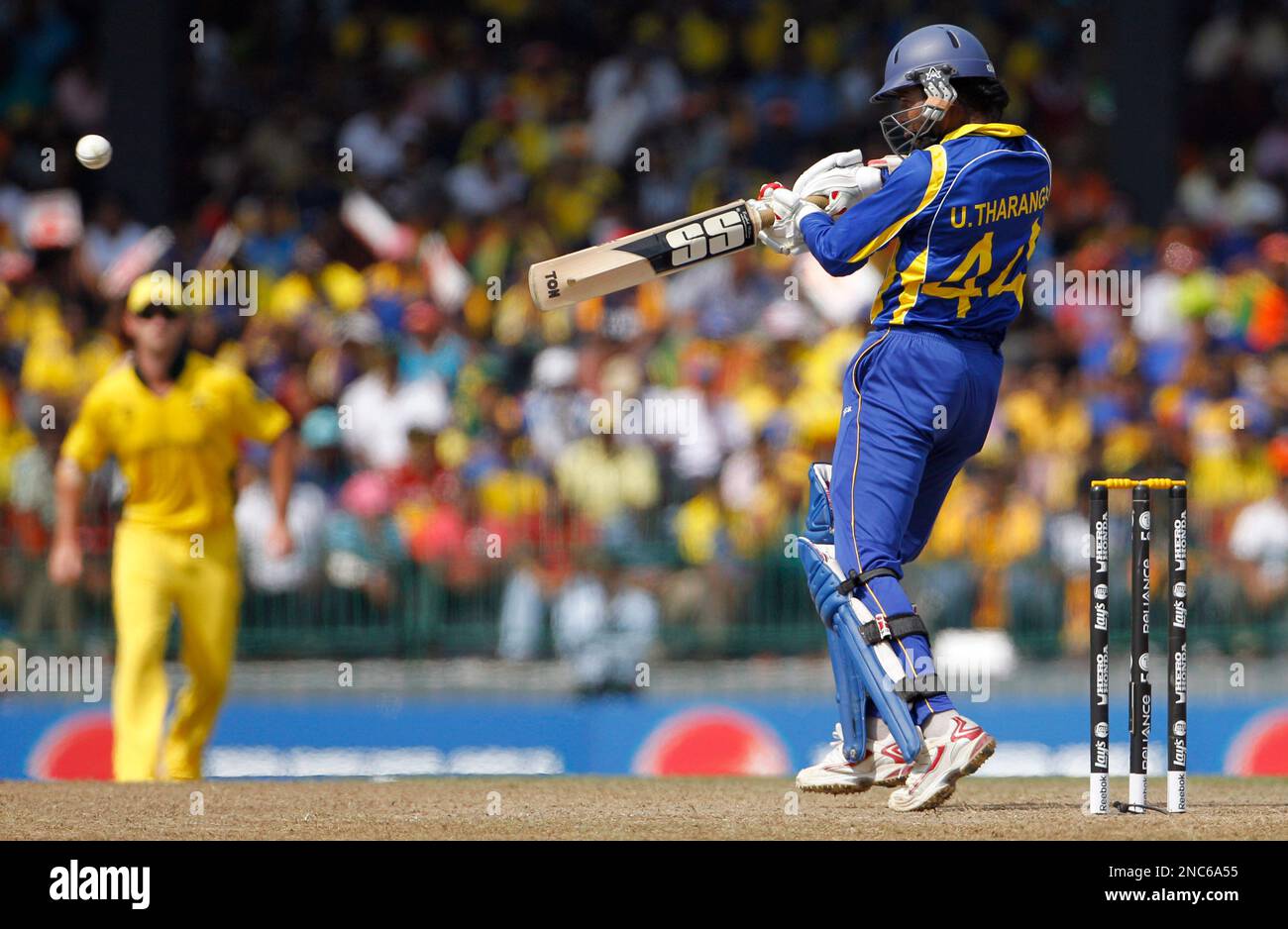 Sri Lanka's opener Upul Tharanga drives to be caught out by Australia's Steve Smith, unseen, for 6 runs, during their ICC Cricket World Cup match in Colombo, Sri Lanka, Saturday March 5, 2011. (AP Photo/Andres Leighton) Stockfoto