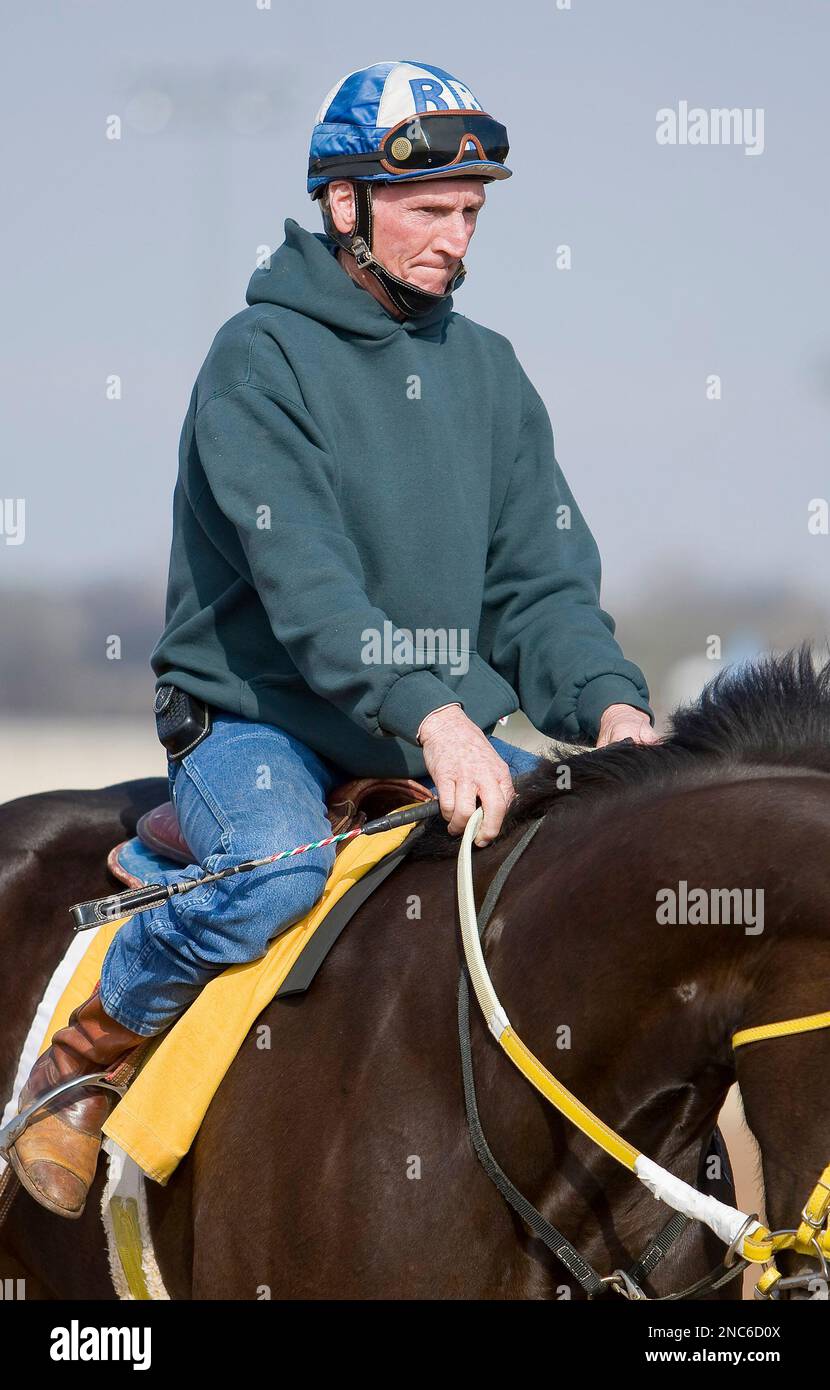 Jockey Roy Brooks goes for a morning trot on one of the race horses he