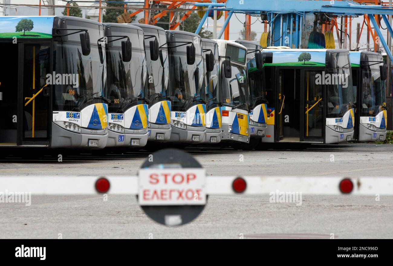 Buses are parked at the biggest depot in Athens during a 24-hour strike ...
