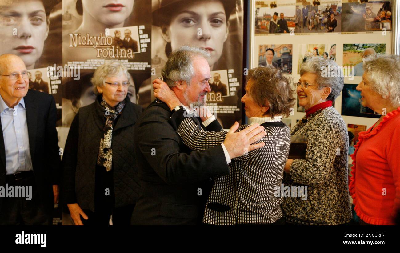 Producer patrik pass center left greets some of the holocaust