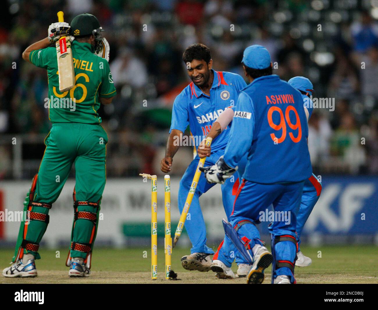 India s Bowler Munaf Patel Center Takes A Stump As He Celebrates india-s-bowler-munaf-patel-center-takes-a-stump-as-he-celebrates