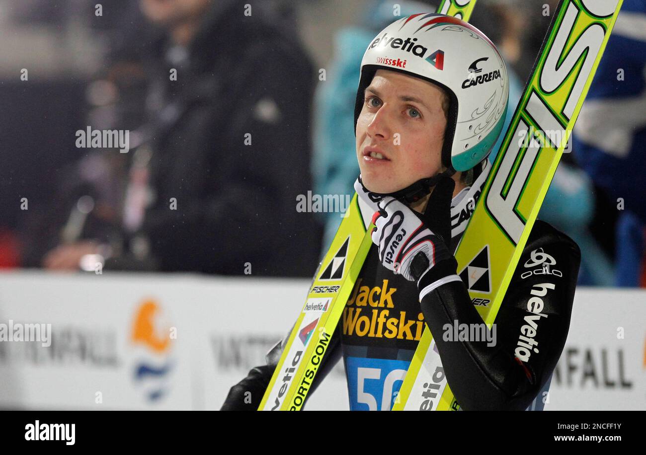 Simon Ammann from Switzerland reacts after his first competition jump during the first event of the four hills ski jumping tournament in Oberstdorf, southern Germany, on Wednesday, Dec. 29, 2010. (AP Photo/Matthias Schrader) Stockfoto