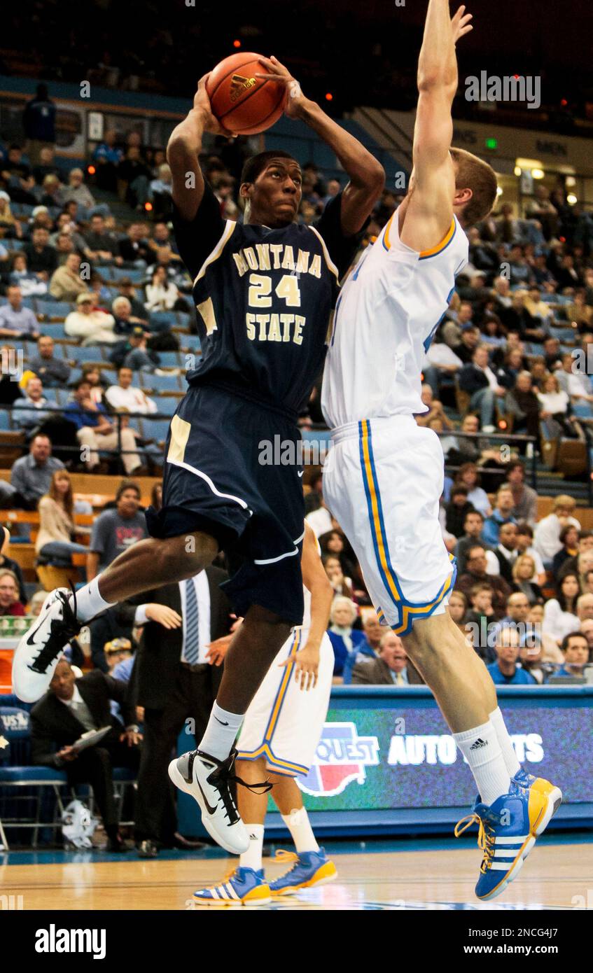 Montana State forward Tre Johnson shoots over UCLA forward Brendan Lane