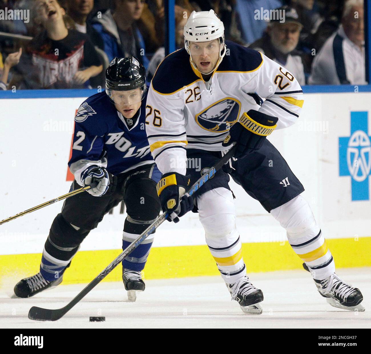 Buffalo Sabres left wing Thomas Vanek (26) breaks out past Tampa Bay Lightning center Dana Tyrell (42) during the first period of an NHL game Saturday, Dec. 18, 2010, in Tampa, Fla. (AP Photo/Chris O'Meara) Stockfoto