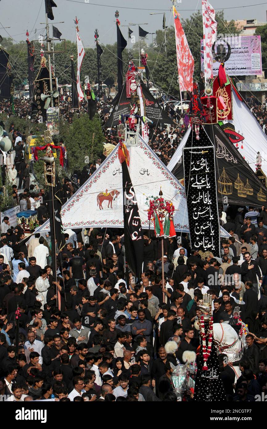 Pakistani Shiite Muslims take part in a Muharram procession in Karachi ...