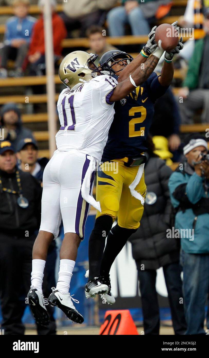 Washington wide receiver D'Andre Goodwin, left, fights for a reception