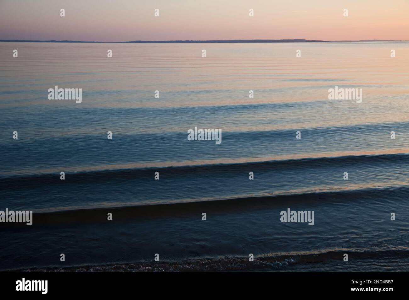 Sonnenuntergang über dem Meer, Llandudno, Wales Stockfoto