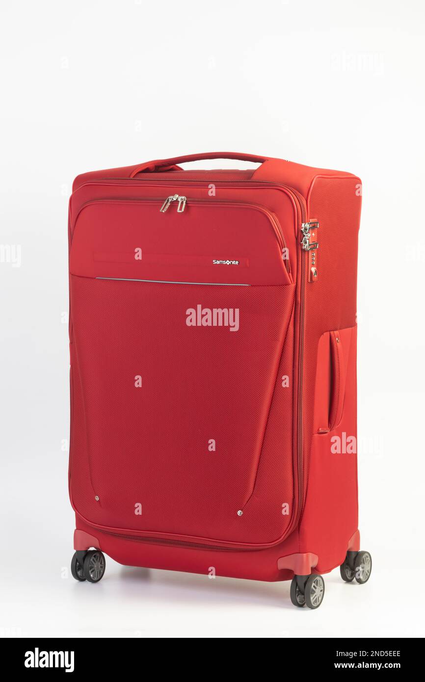Ein roter, leichter Samsonite-Koffer. Stockfoto