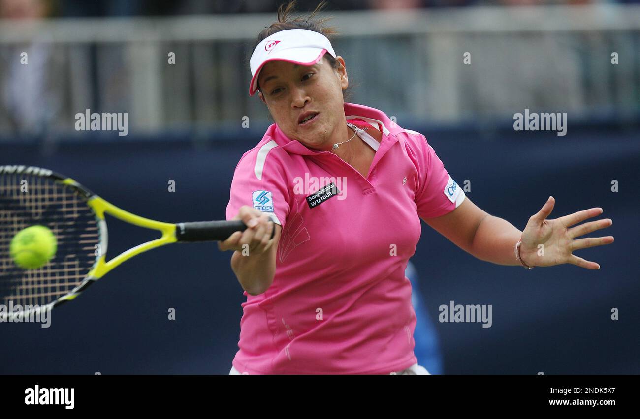 Tamarine Tanasugarn of Thailand hits a return shot during her women's second round tennis match against Sania Mirza of India at the Aegon Classic in Birmingham, England, Thursday, June 10, 2010. (AP Photo/Simon Dawson) Stockfoto
