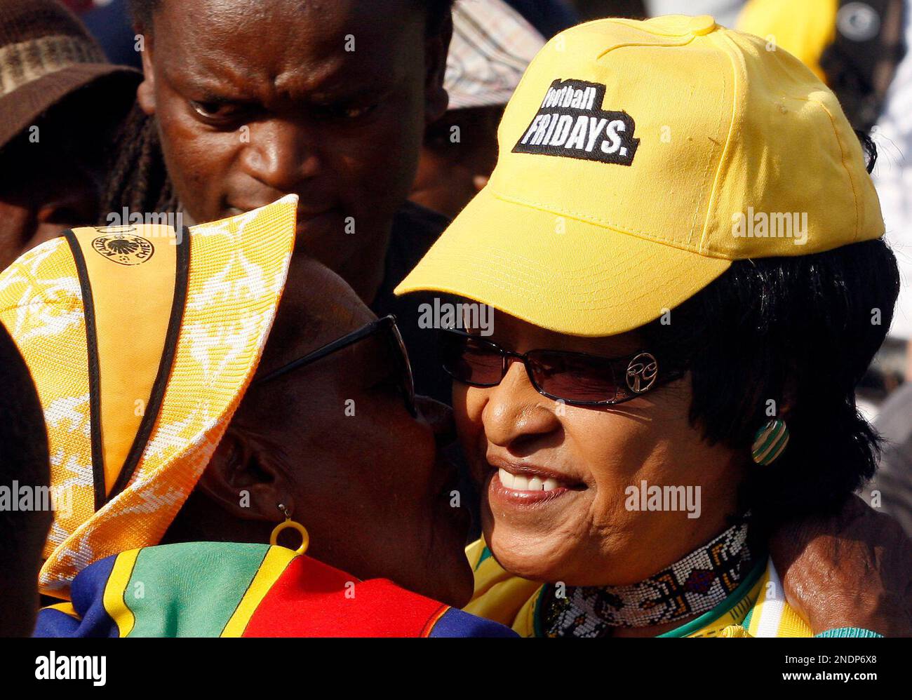 Former President Nelson Mandela ex-wife Winnie Mandela, right, meets a fan during a 2010 FIFA World Cup street party at Vilakazi street in Orlando East, Soweto, South Africa, Friday May 21, 2010. (AP Photo/Themba Hadebe) Stockfoto