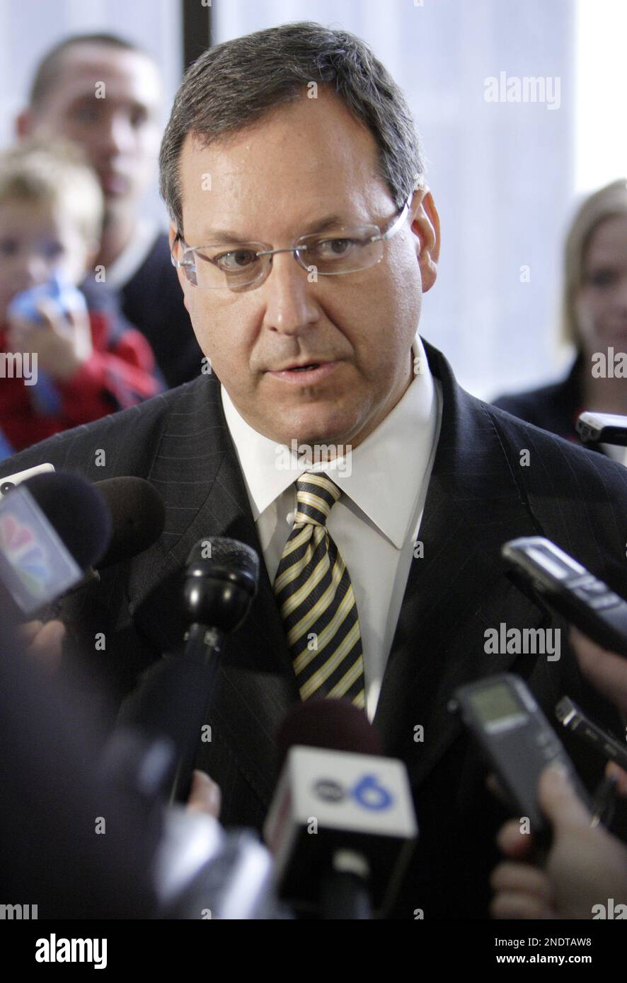 Former Ohio Attorney General Marc Dann speaks to reporters outside of