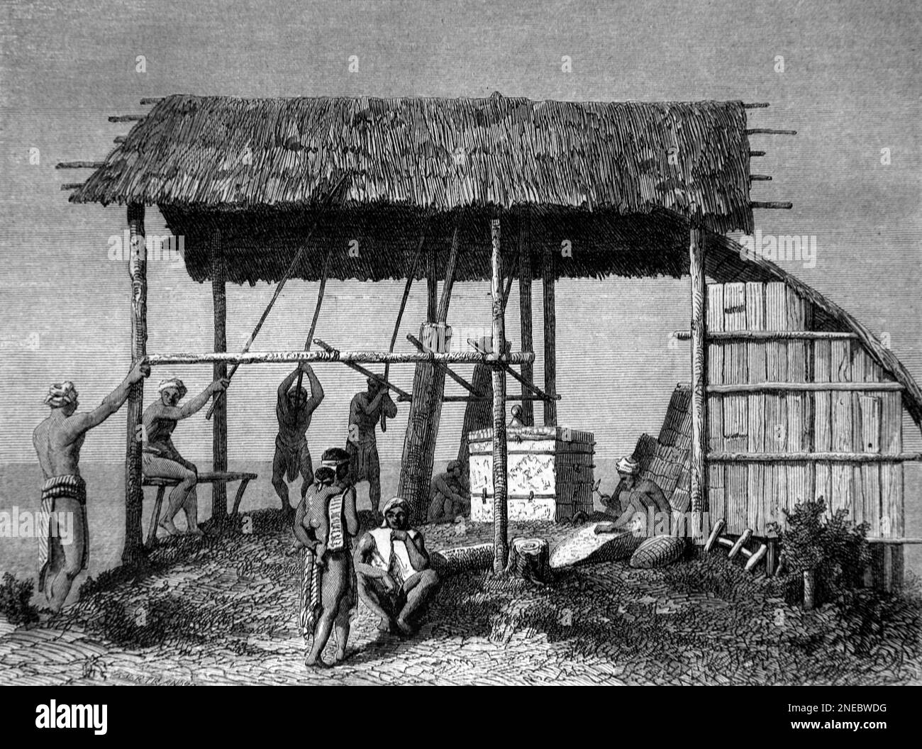 Traditionelle Dayak Forge, Workshop oder Smithy mit Grasdach und Handwerkern Borneo. Vintage-Gravur oder Abbildung 1862 Stockfoto