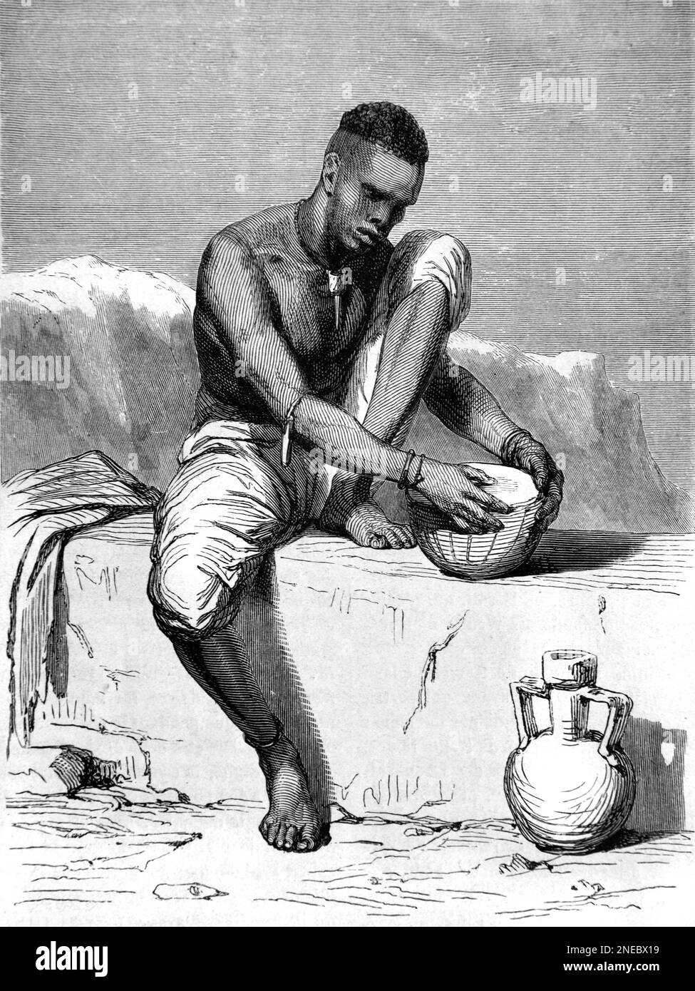 Dinka-Mann oder Stammesmann, der eine Trommel repariert. Der Dinka-Stamm ist ein nilotisches Volk, das hauptsächlich in Südafrika lebt. Vintage-Gravur oder Abbildung 1862 Stockfoto