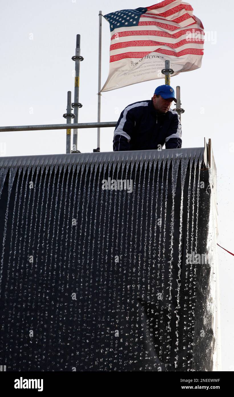 Ribbons of water flow off a mock-up waterfall designed for the National ...
