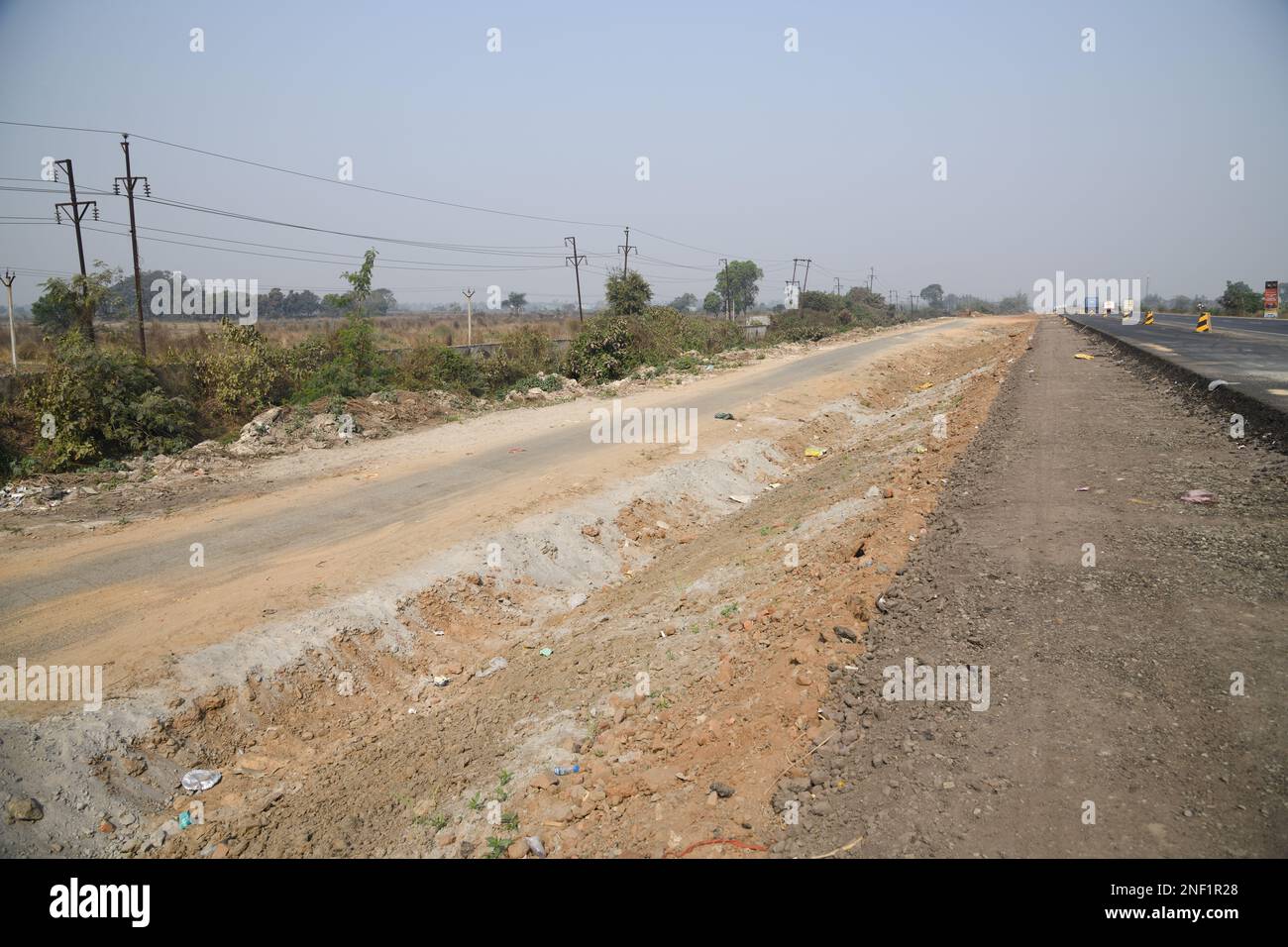 Der asiatische Highway 45 wird in der Nähe des Tata Nano-Kontroversen-Landes in Singur, Hooghly, West Bengal, Indien erweitert. Stockfoto