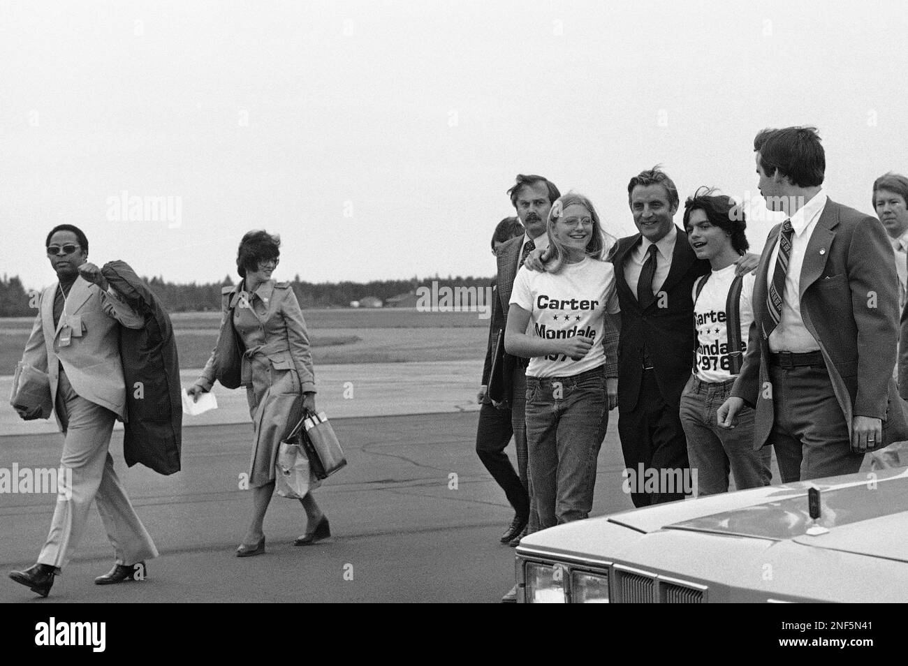 Democratic vice presidential candidate sen walter mondale right is