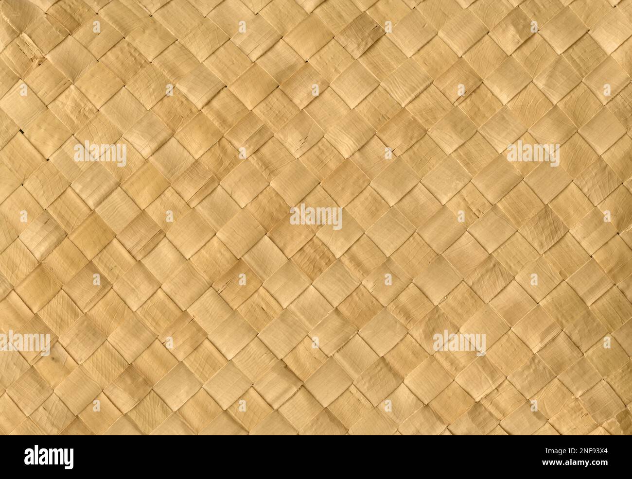 Gewebte Bambusmatte in Beige. Horizontales Hintergrundbild Stockfoto