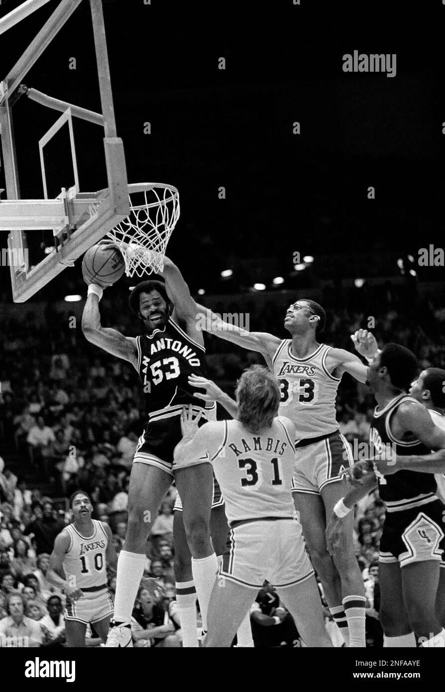 Center Artis Gilmore (53) of the San Antonio Spurs hauls down a rebound