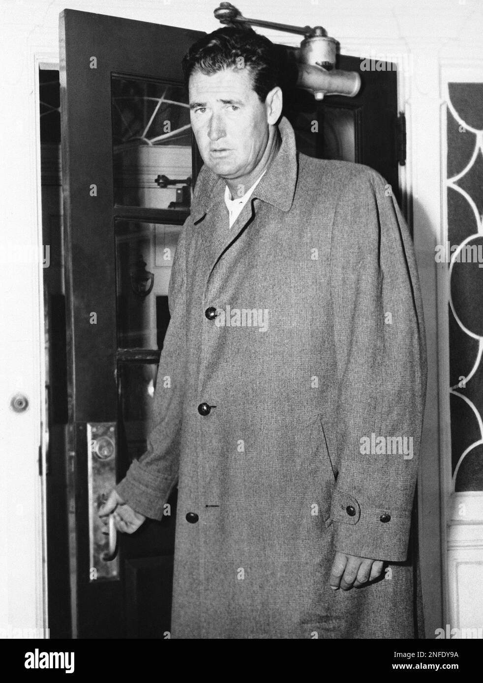 Ted Williams, Boston Red Sox slugger, enters the New England Baptist