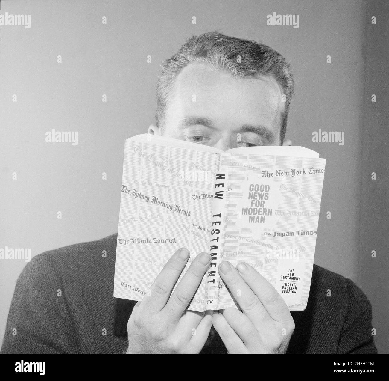 unidentified-man-shown-reading-today-s-english-version-of-the-new