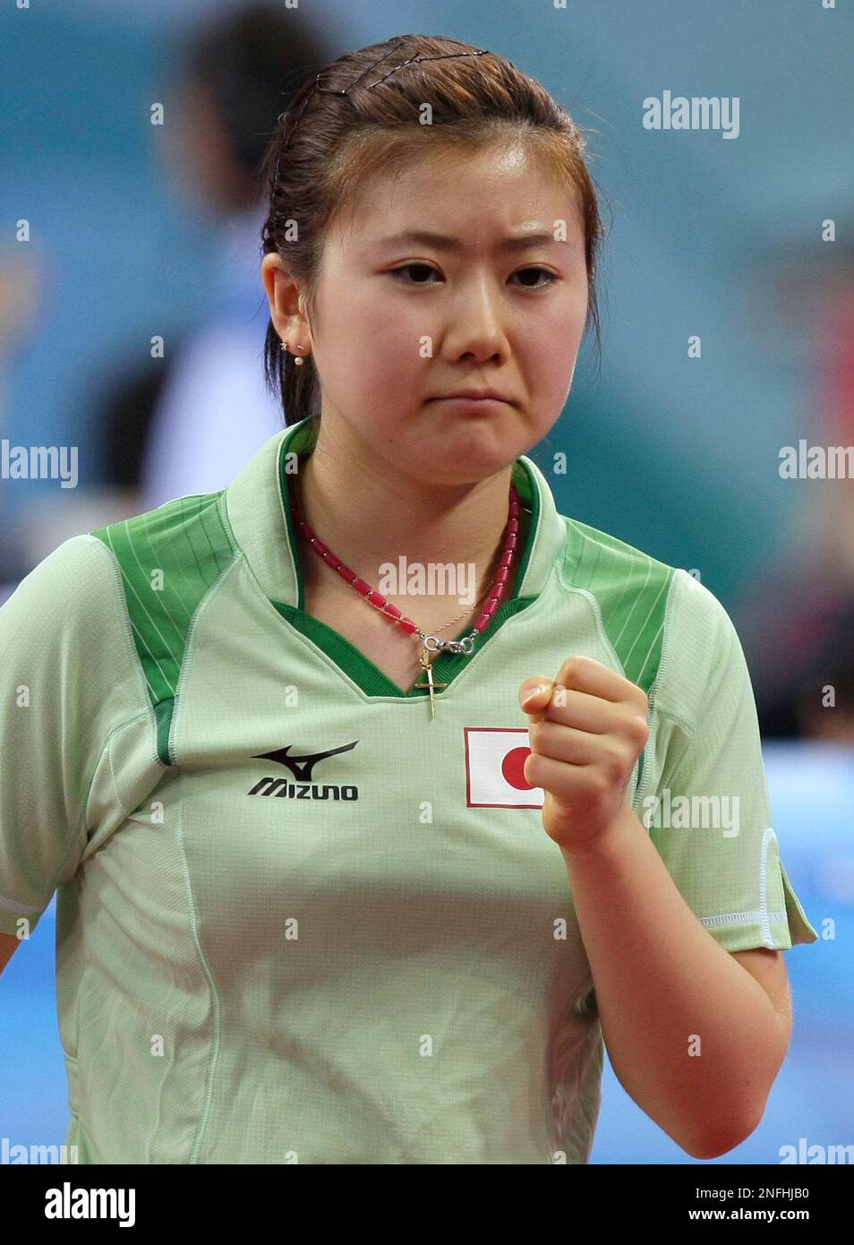 Japan's women's team Ai Fukuhara reacts in a play against Spain's women's team Yanfei Shen during the women's table tennis team competition at the Beijing 2008 Olympics in Beijing, Thursday, Aug. 14, 2008. (AP Photo/Chitose Suzuki) Stockfoto
