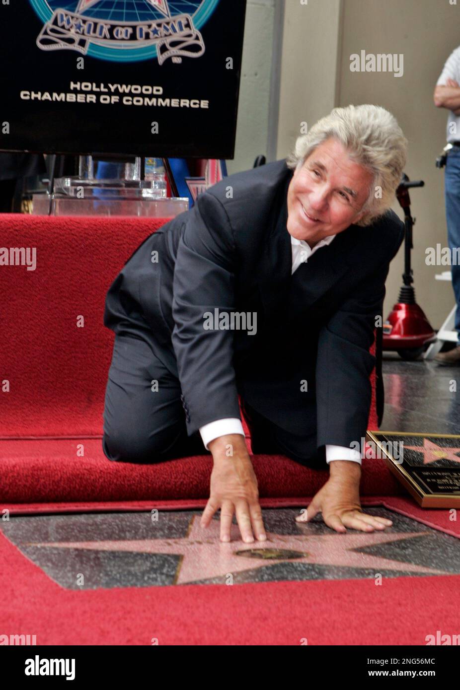 Legendary Hollywood producer Jon Peters poses with his new star on the