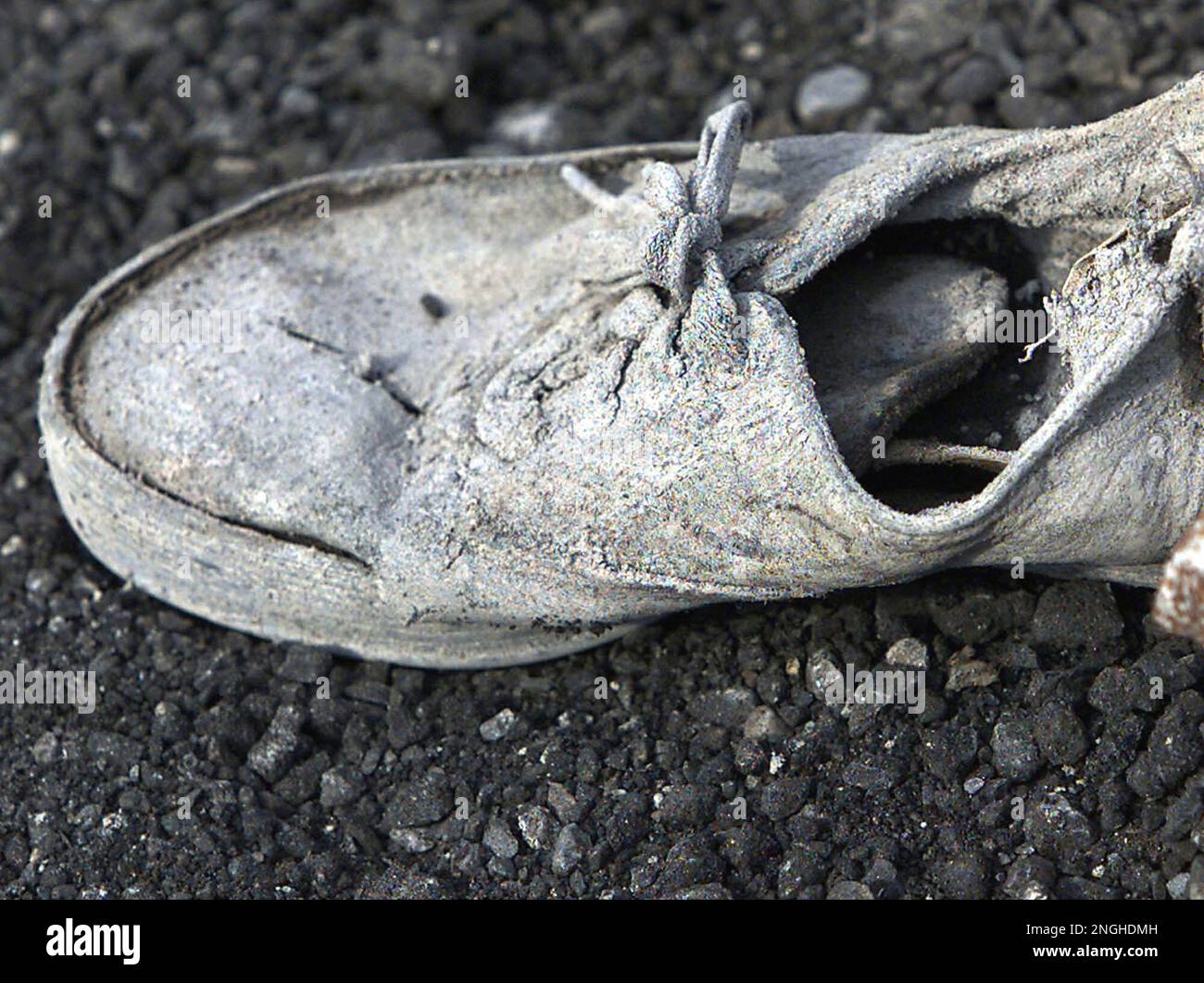 A dirt covered shoe seen Wednesday, Oct. 24, 2001, at the Fresh Kills Landfill on Staten Island