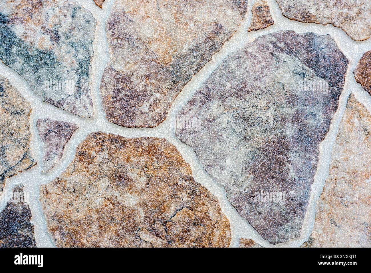 Hintergrund einer alten Mauer aus Naturstein Stockfoto